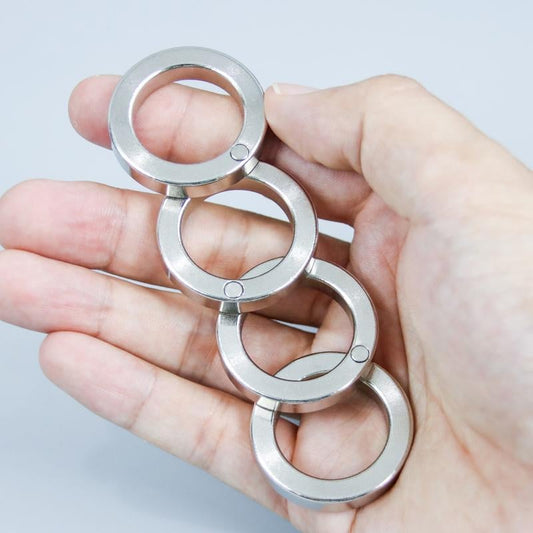 Anillo de Gatillo Plegable de Cuatro Dedos