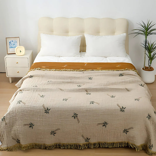 SolTropica: Mantas de algodón en diseño tropical de palmeras con estructura reversible y flecos decorativos – para sofá y dormitorio